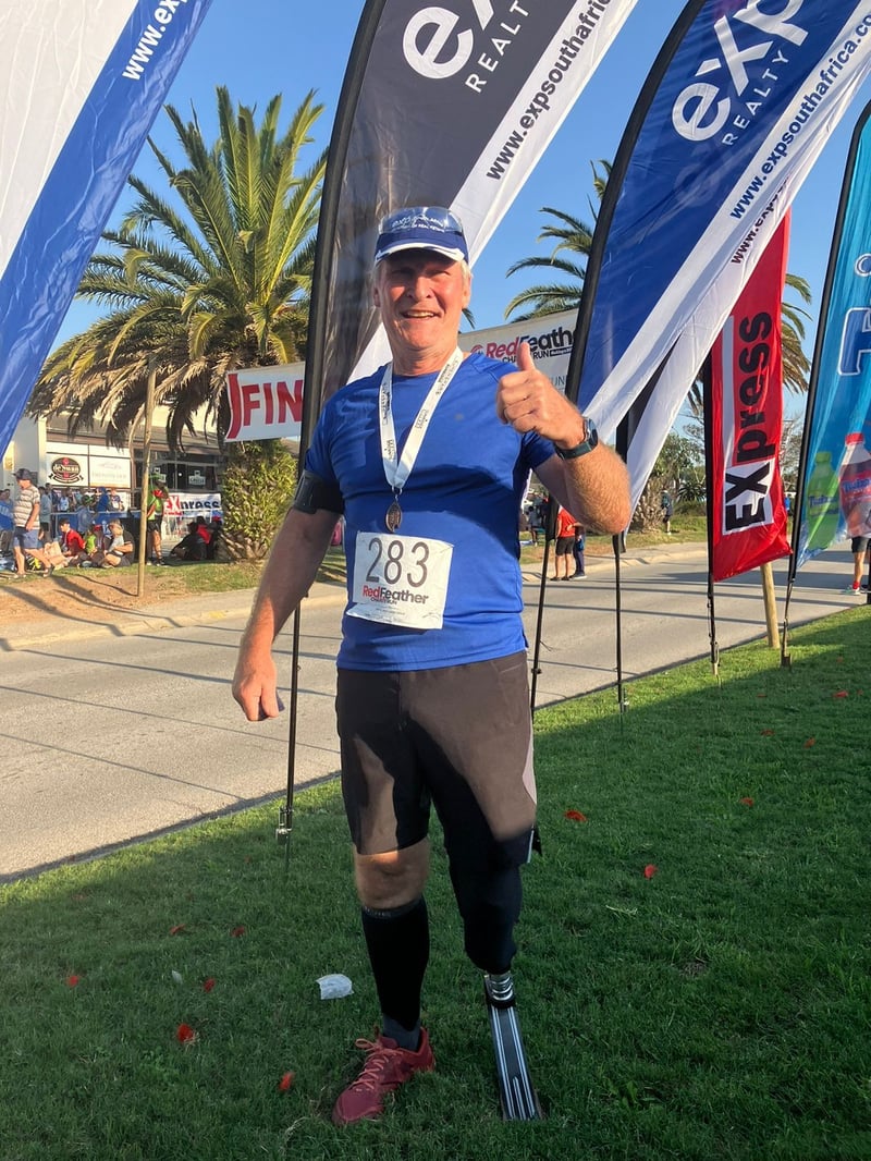 Real Estate Agent, Heinz Mueller, Triumphs in Red Feather Charity Run, Inspiring Hope and Resilience as He Completes 10km Distance