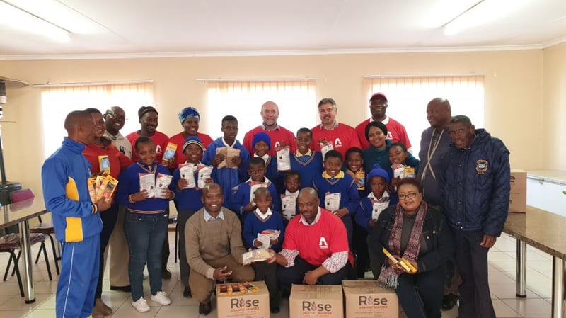 AFRISAM EMPOWERS EMFULENI PUPILS WITH FOOD PACKS AND STATIONERY 