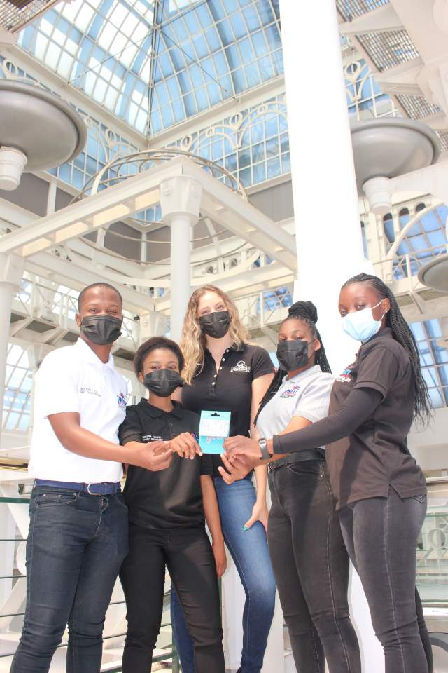 # StrongerTogether the team from Unity and Interaction Foundation: Lindokuhle Zulu (Chairperson); Senzeni Lushozi (Deputy Secretary); Nandipha Senamile Mabaso (Spokesperson); Fezile Ntshaba (Research &amp; Innovation) with Lisa Folkard from the Pavilion Shopping Centre paying it forward!  