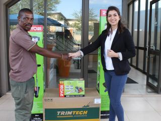 Mr. Makaringi of T-Rex Gardening services with Ms. Antonieta Bupo of Bupo Animal Health