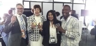 Toasting the success of the 2019 Plastics Colloquium (fltr) Anton Hanekom (Plastics SA), Minister Barbara Creecy (DEAFF), Patricia Pillay (CGCSA) and Simon Mbata (SA Waste Pickers Association)