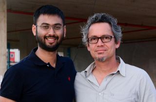 Adhir Imrith is congratulated by Arup director, Lee-Zane Greyling on his well-deserved promotion.