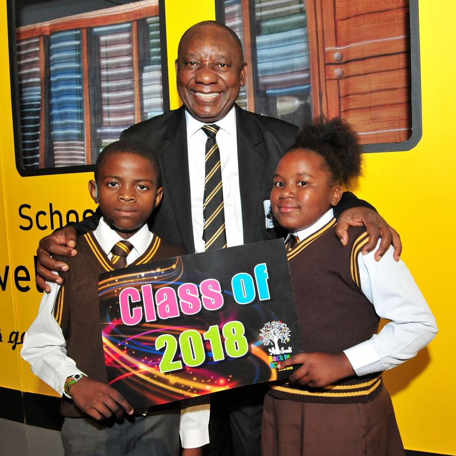 Chairperson of Adopt-a-School Foundation, President Cyril Ramaphosa (middle) with Rotondwa Masuanyise (left) and Asakundwi Munyai (right) from Tshilidzi Primary School in Soweto, who acted as Masters of Ceremonies at Adopt-a-School Foundation’s 12th annual ‘Back to School’ party on Saturday. 