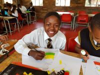 Qhobosheane grade six and seven learners creatively celebrating their teachers at the Adopt-a-School Big Books event at their school this morning. 