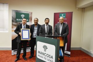 Left to Right : Mahomed Karodia( Director Mancosa), Louis Taylor (Director DBE), Ahmed Motala(CEO New Africa), and Dr Yusuf Karodia( Director Mancosa)