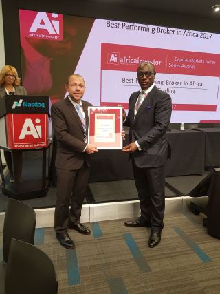 Daniel Kibel, Director CM Tradng, receiving the Best Performing Broker in Africa Award at NASDAQ in New York