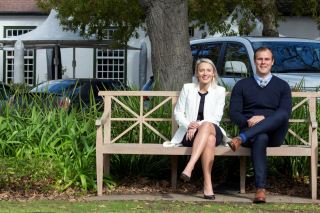 L-R)  Megan Milne (sales manager of Tyson Properties Southern suburbs) &amp; Nick Pearson, director in the Cape.  Tyson Properties has opened a Western Cape headquarters and Cape Town Southern Suburbs flagship office in a wine cellar. It&#039;s on the historic Alphen Estate, once part of Simon Van Der Stel&#039;s Groot Constantia. 