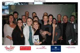 Tandy Coleman (centre, holding the book) was joined by friends and family at the launch of “Expert Mavericks” which took place at a gala event held at Melrose Arch in Johannesburg recently.