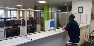 Tectra Automation&#039;s protective aluminium profiles help prevent COVID-19 spread, by creating a physical barrier between staff and customers, when making a purchase.