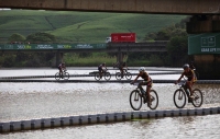 At the finish of the 2014 Nedbank sani2c on Scottburgh beach riders had to carefully navigate their bicycles along the narrow floating bridge, built specifically for this race. 