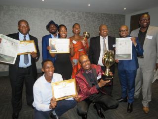 The TSRF managment team celebrates their best practice awards and the recognition it received from the Institute of Retirement Fund Africa and industry peers.