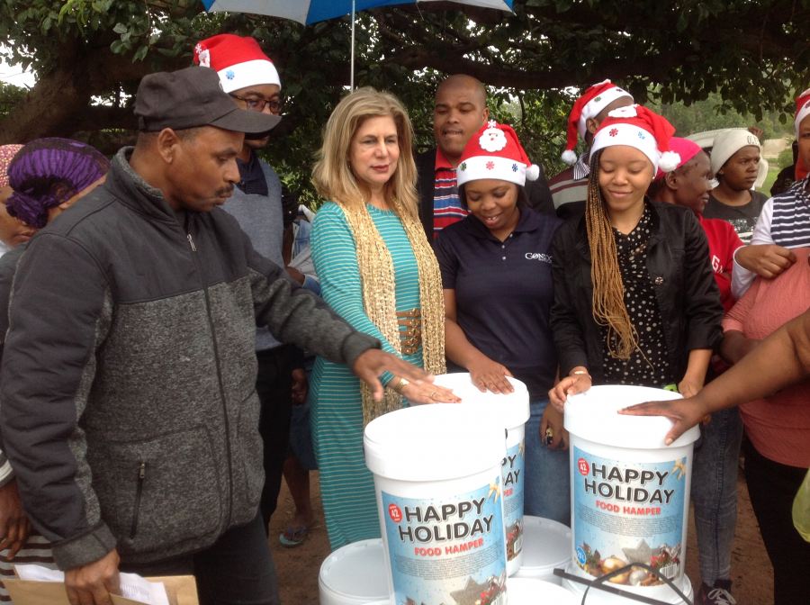 Seen at the Lacey Road informal settlement are Deputy Mayor Fawzia Peer, together with Conlog Management and staff and residents from the Lacey Road settlement.