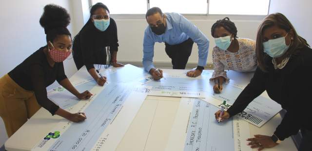 Checking out their SOS cheques to their respective schools that they are supporting are the representatives from SA Retail Properties Pty Ltd: (L-R) Noluthando Cele (Bluff Towers), Sesethu Senene (Pine Walk Centre), Arrif Shaik (Hayfields Mall), Tricia Nxumalo (Davenport Square), Sharmaine Ramsahi (Springfield Value Centre)