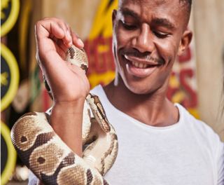 Familiarising himself with snakes is the 2017 Mr uShaka - Philani Zondo