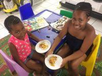 Youngsters enjoying their flapjacks