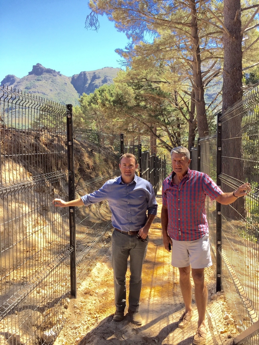 David Fichardt, development manager of the Constantia Nek Estate (left), and David Delbridge, one of the developers at the pre meter security fencing which is being installed at the estate.