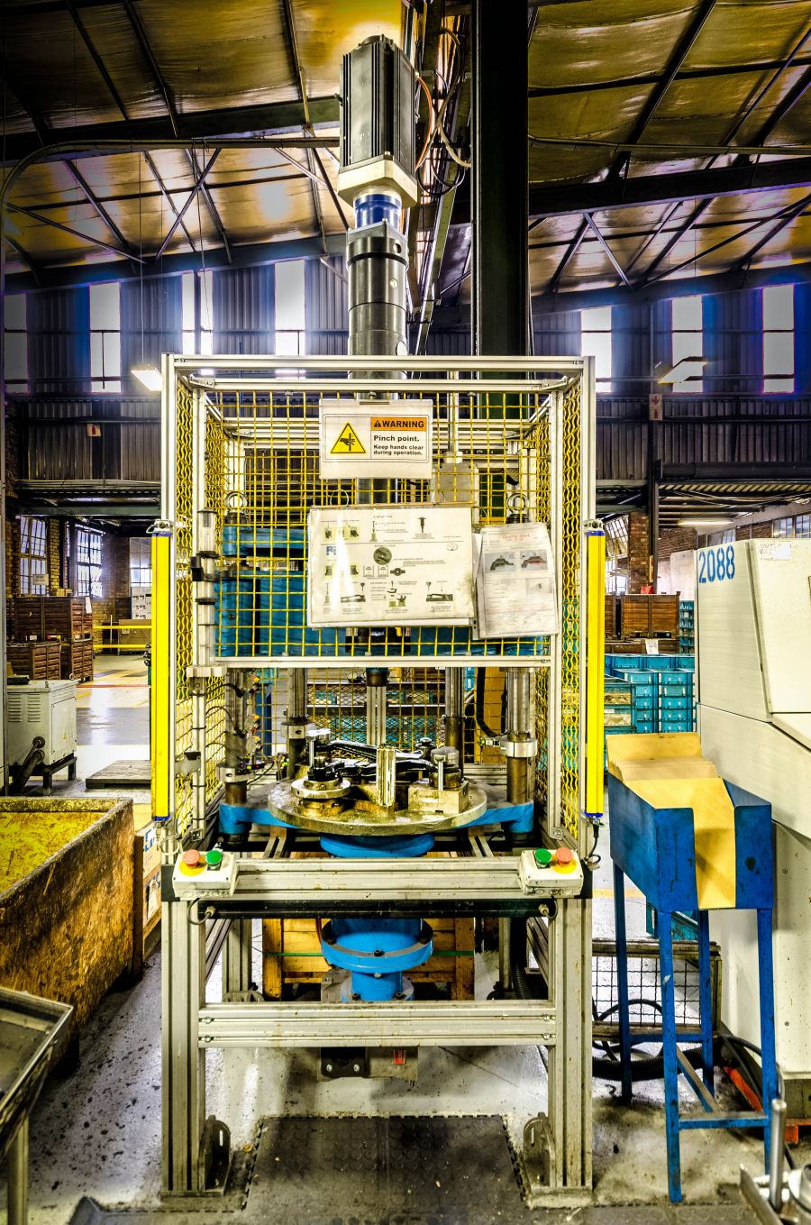 The servo-driven automotive press used by AI to assemble various front suspension linkages for a local range of light commercial vehicles. The press produces one part every 40 seconds for 22 hours a day. 