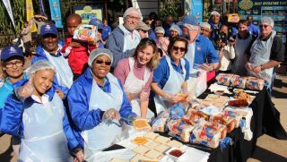 uShaka Marine World CEO, Dr Stella Khumalo with her uShaka and Sea World teams making 5000 sandwiches amongst the many other initiatives that they have planned for Mandela Day…