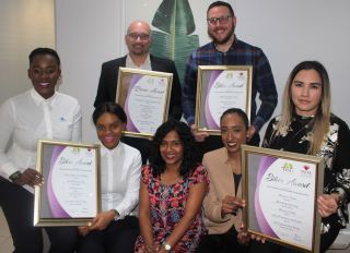 SEATED – From Left to Right: Siphumelele Khuzwayo (Umlazi Mega City), Zinhle Zungu (Umlazi Mega City), Ruth Isaac (Springfield Value Centre), Adeela Haffejee (Musgrave Centre), Mariam Omarjee (Musgrave Centre)  – STANDING – André Williams (SACREL) &amp; Donald Mclellan (Broll Property Group).