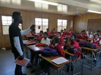 Caption: Columba Leadership alumni (Domingo Nkuna), instructs learners as part of the ‘Absa ReadytoWork’ programme, where they received training on essential skills needed to gain future employment.  