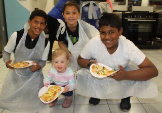 Some of the kids with their pizza&#039;s